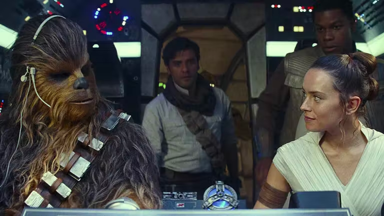 Suotamo as Chewbacca with Oscar Isaac, John Boyega, and Daisy Ridley in Star Wars: The Rise of Skywalker. Photo by Lucasfilm, Ltd.